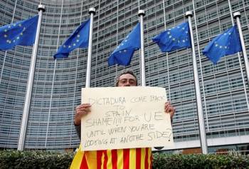 EU urges dialogue in cautious reaction to Catalonia crisis